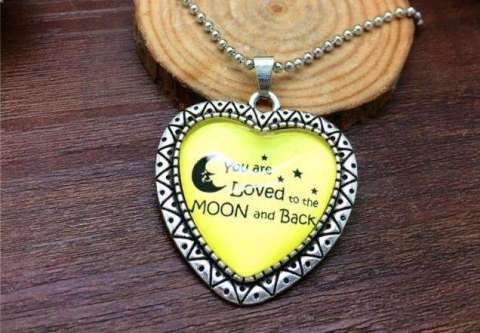 Several Styles of I Love You to the Moon and Back Necklaces