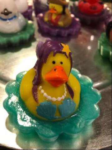 Rubber Duckie Swimming in Soap