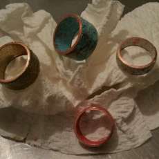 Enameled Rings on Copper Base