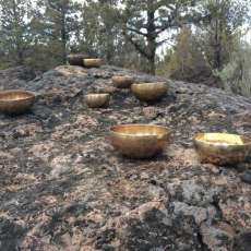 Tibetan Singing Bowls on Basalt Lava