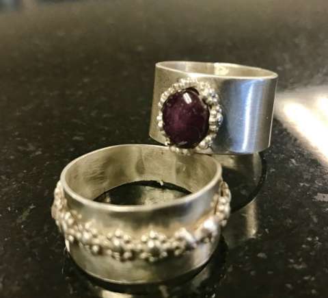 Star Ruby and Silver Flower Rings
