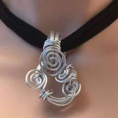 Aluminum Spirals on Black T-Shirt Cord