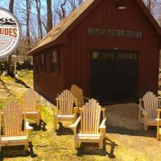 2latitudes Llc. Shop With Chairs Outside