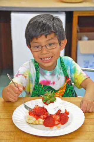Child With Our Yummy Strawberry Shortcake