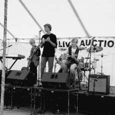 Saint Anne Community Bazaar, Ryan Comes Up From Behind the Drums to Sing, Play Tambourine, Or Play Harmonica, Oct. 2017