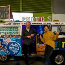 Standing in Front of Bus