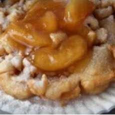 Peach Covert Funnel Cake With Powdered Sugar