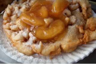 Peach Covert Funnel Cake With Powdered Sugar