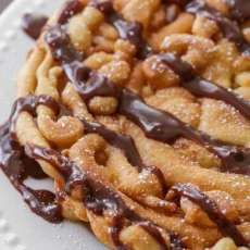 Chocolate Covered Funnel Cake With Powdered Sugar