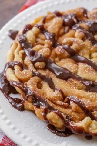 Chocolate Covered Funnel Cake With Powdered Sugar