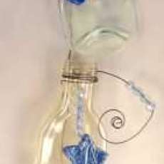 Three Bottles With Blue Stars