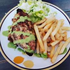 Pollo a La Brasa(Grilled Peruvian Chicken, French Fries,Aji Sauce.