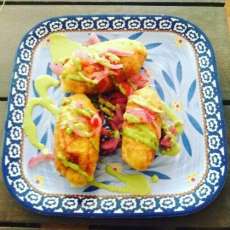 Chicken Stuffed Potatoes With Peruvian Green Hot Sauce.