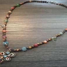 Beautiful Multi-Colored Beaded Necklace With Colorful Butterly Pendant