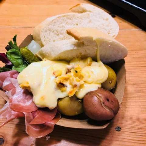 Melted Raclette Cheese Over Bread, Boiled Potatoes, Prosciutto Ad Greens