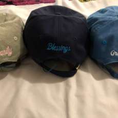 Back of Hats With Inspirational Words