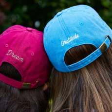 Back of Hats With Inspirational Words