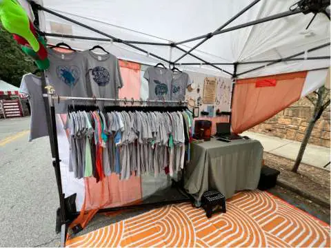 Left Side Tent Setup - Shirts and Laser Station