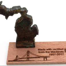 Piece of Mac Cutout With Wood Base