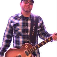 Kish - Lead Vocals, Electric Guitar