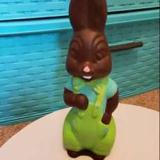 Faux Chocolate Bunny Sculpture With Overalls