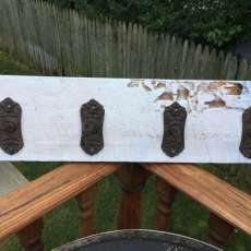 Antique Hooks on Stained Reclaimed Wood