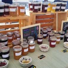 Locally Grown and Gathered Jams and Jellies at a Summer Market
