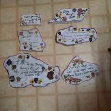 Stone Signs With Painted Lettering, Hand Pressed Flower Designs and Sealant