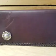 The Chocolate Kangaroo Checkbook Wallet With Inside Card Pockets, Removable Checkbook Cover and Double Loop Lace.