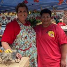 Mama Landry With Her Daughter and #1 Assistant, Ali.