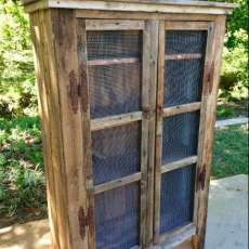 Kitchen Cupboard With Screened Doors. $650-750. Price May Vary