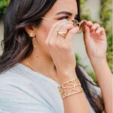 Brook & Branch Solitude Camo Cuff Bracelet, Whirlwind Statement Ring, Essence Bar Drop Earrings, Perennial Pearl Stud Earrings, and Serenity Wave Series Necklace