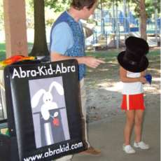 Fun With Kids at Outdoor Festival Magic Show