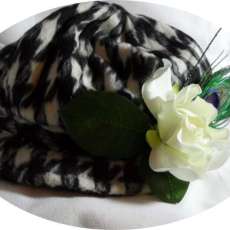 Houndstooth Hat with White Flower and Feathers