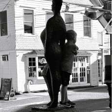 Youngster Perches on Les Touristes, Provincetown MA