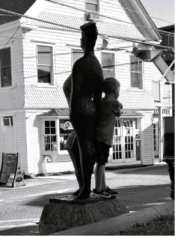 Youngster Perches on Les Touristes, Provincetown MA