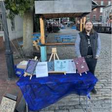 Trying to Sell Gremlins to Passersby in Portland, Maine.