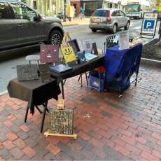 Selling Gremlins During the First Friday Art Walk in Portland, Maine.