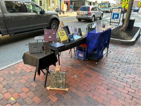 Selling Gremlins During the First Friday Art Walk in Portland, Maine.
