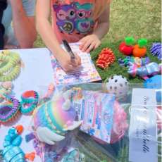 Kids Interacting With Articulated Dragon Toys