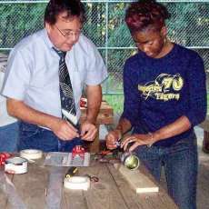 Making a One String With a Festival Goer.
