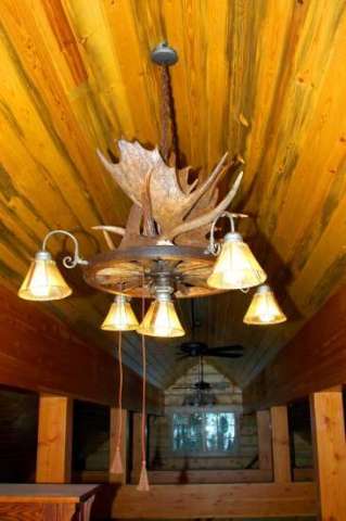 Moose antler-wagon wheel chandelier