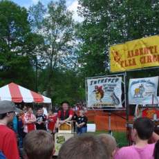 Jim Alberti Playing his Street Organ before Beginning the Flea Circus at Merlefest