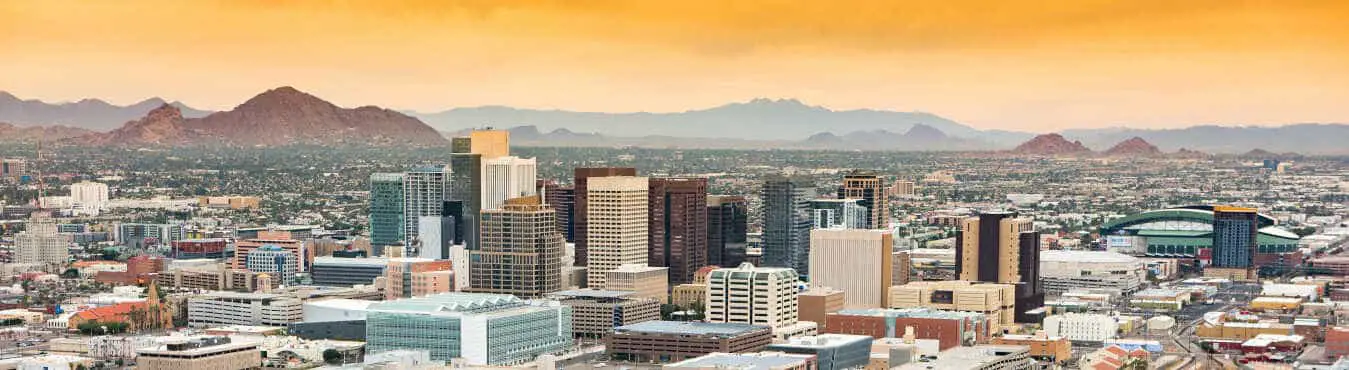 The beautiful Phoenix, Arizona skyline against the day's blue sky.