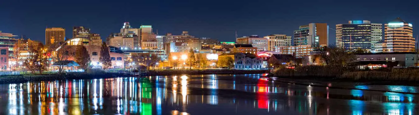 Wilmington, Delaware skyline at night, reflected in Christiana River