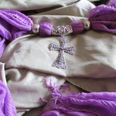 purple scarf with filigree crystal adorned cross