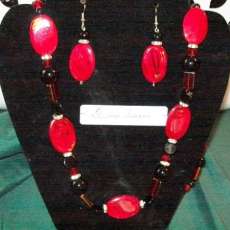 Handmade, one of a kind necklace set. Dark red and black