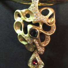 14 k yellow gold Opal, emerald, sapphire and diamond pendant/slide
