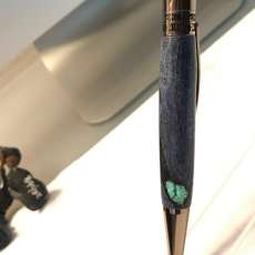 Glacia Twist Pen/Gun Metal made with spalted hackberry with Turquoise inlay