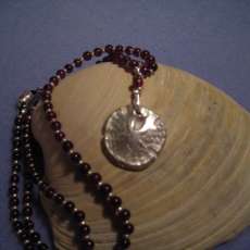 Garnets and Sanddollar Silver Charm Necklace